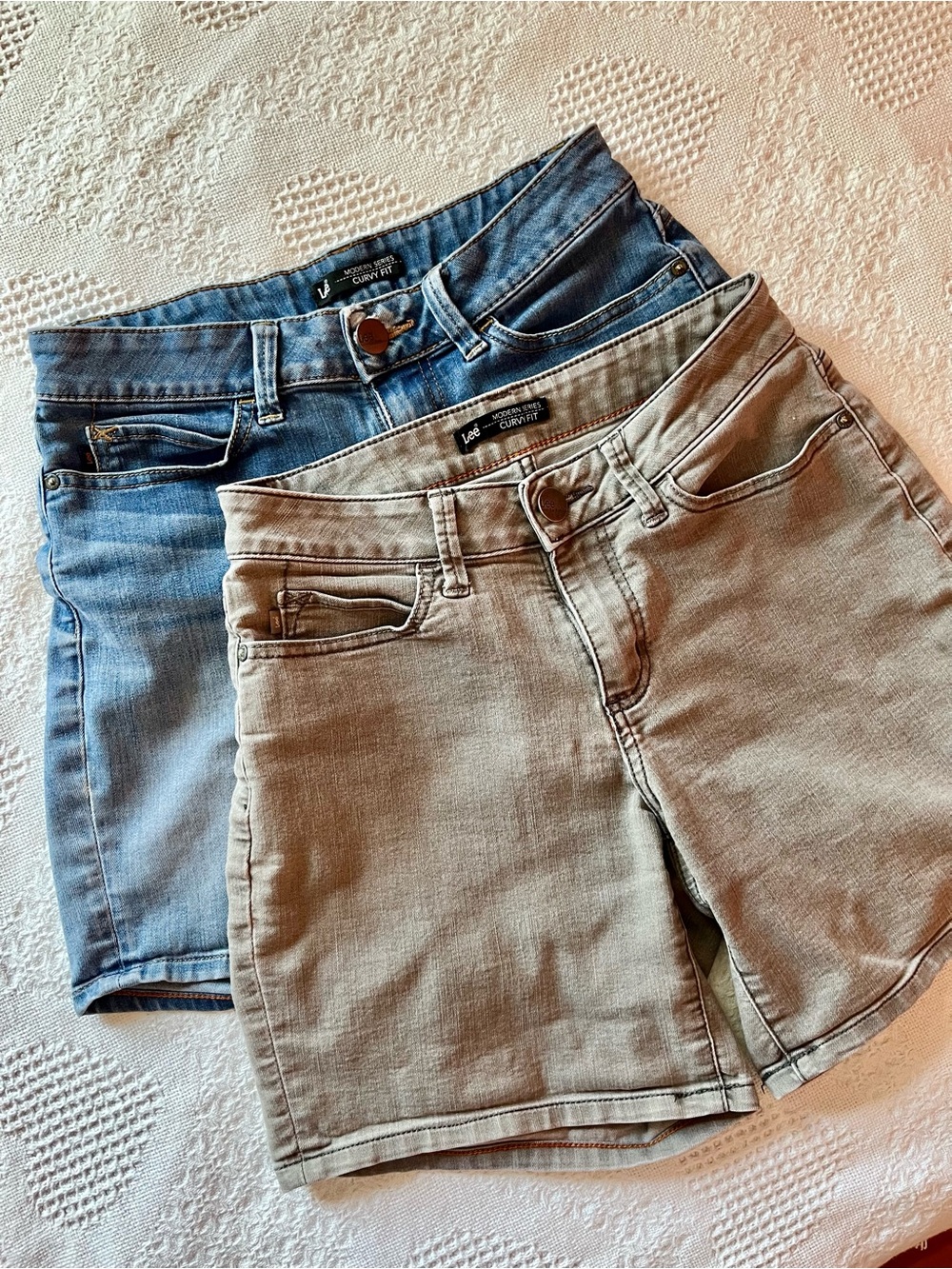 2 Pairs Lee Women’s Mid-Rise Denim Shorts in Blue and in Gray
